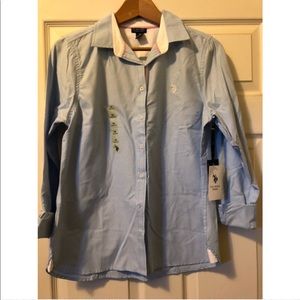 Woman’s blue button down